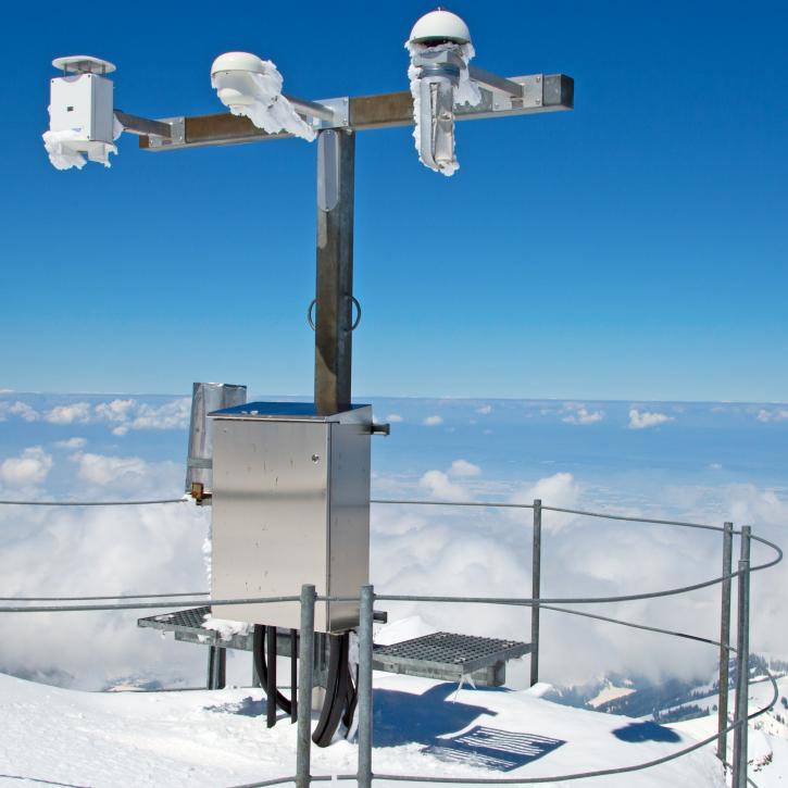 Remote Weather Station above clouds