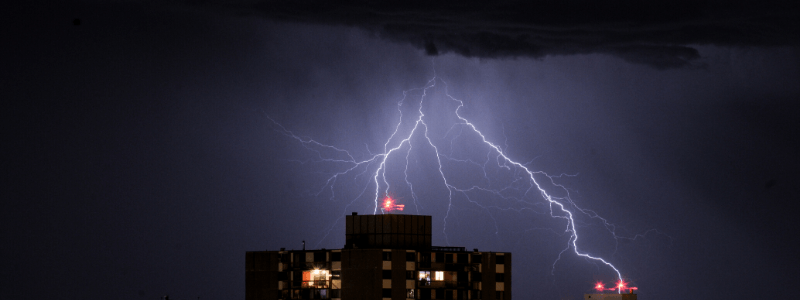 lightning over buildings