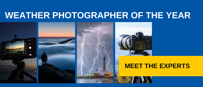 A picture containing a smartphone camera, lightning over Blackpool Tower, clouds over mountains and a digital camera on a tripod