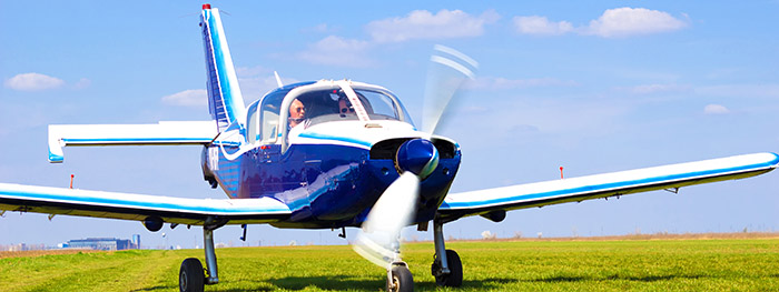 light aircraft on grass