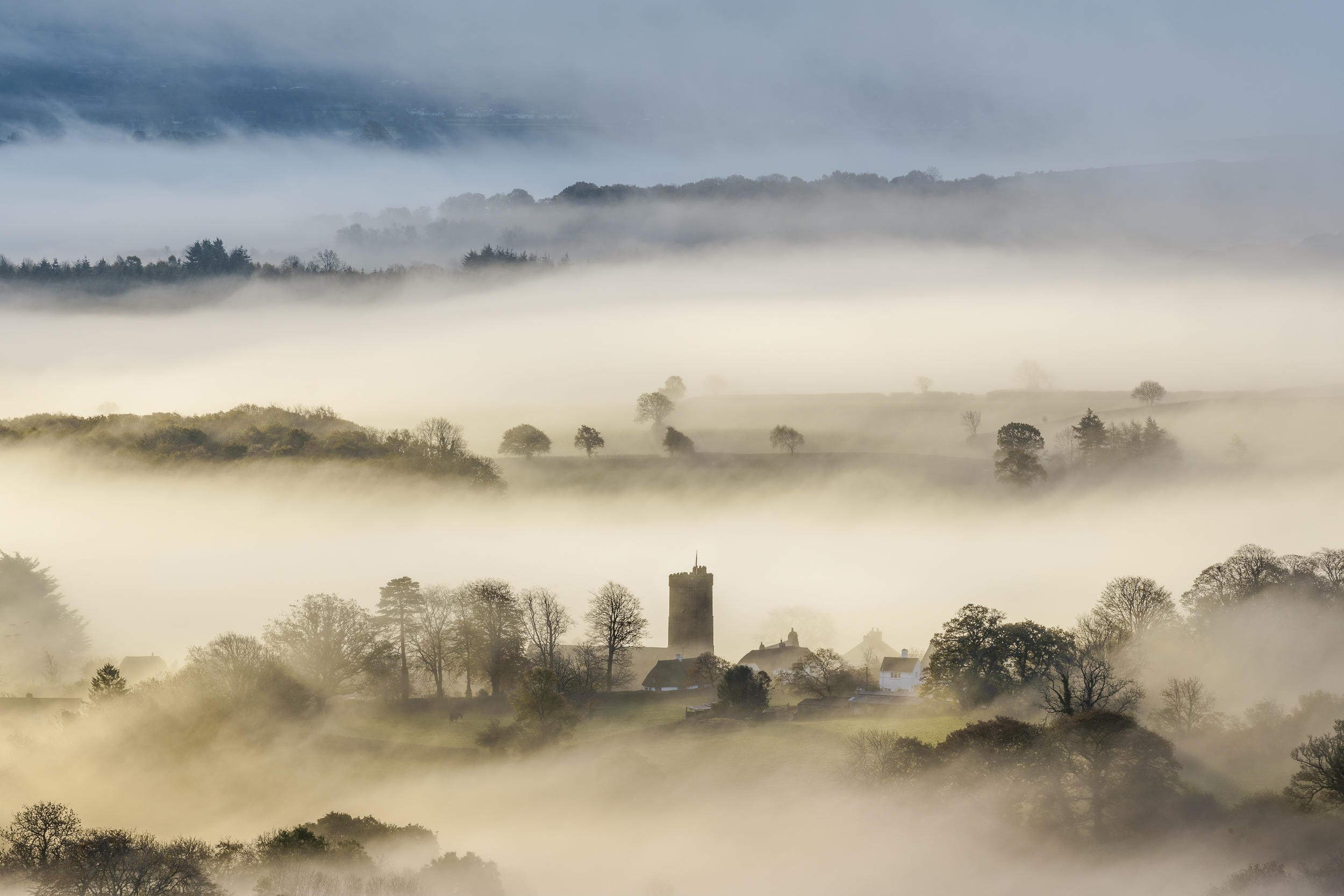 Looking over a misty valley from height