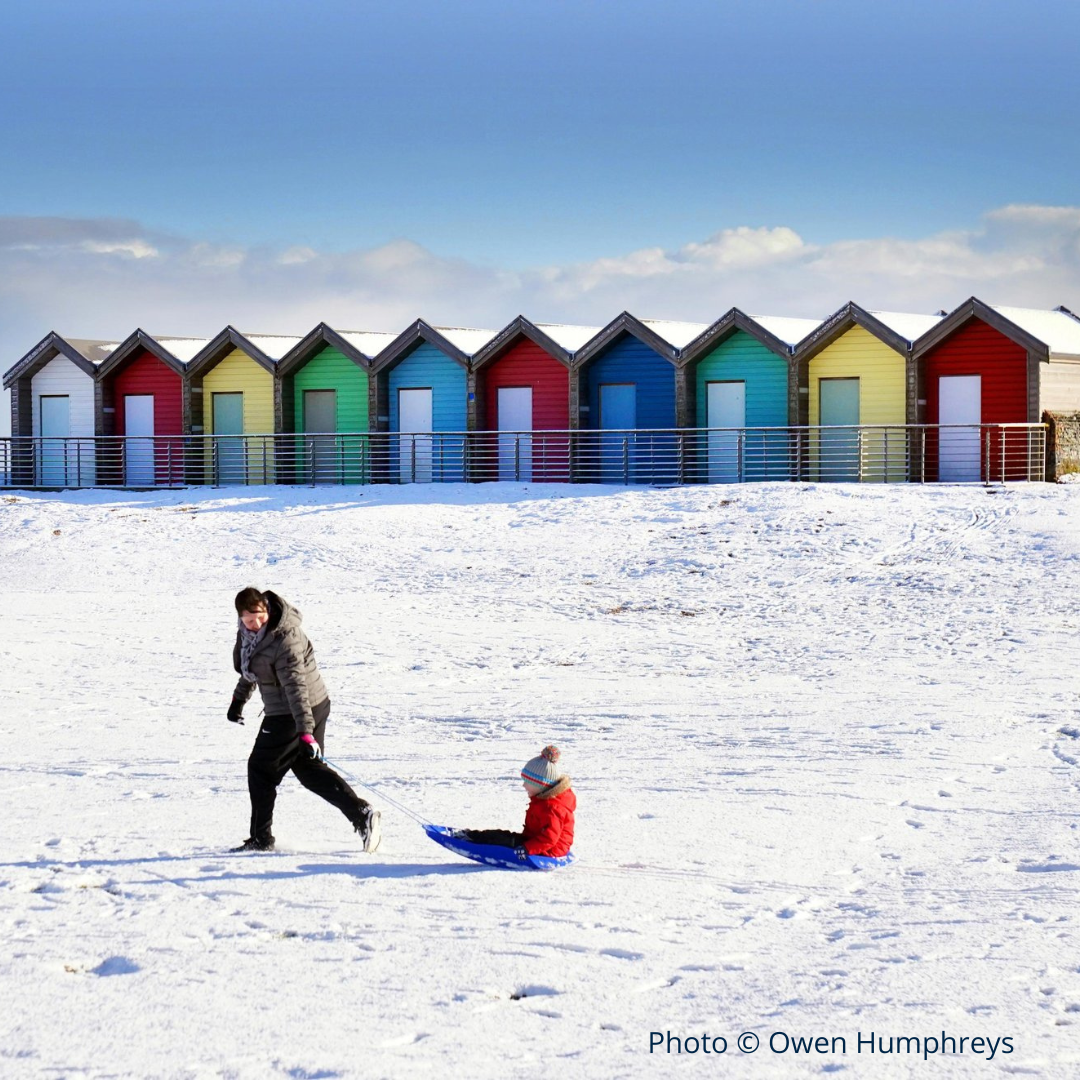 Snow Covered beach huts by Owen Humphreys