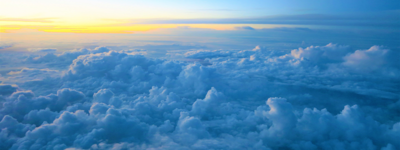 Image of a sunrise above clouds