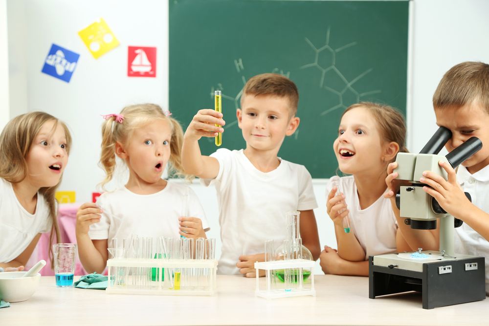 children doing a science experiment