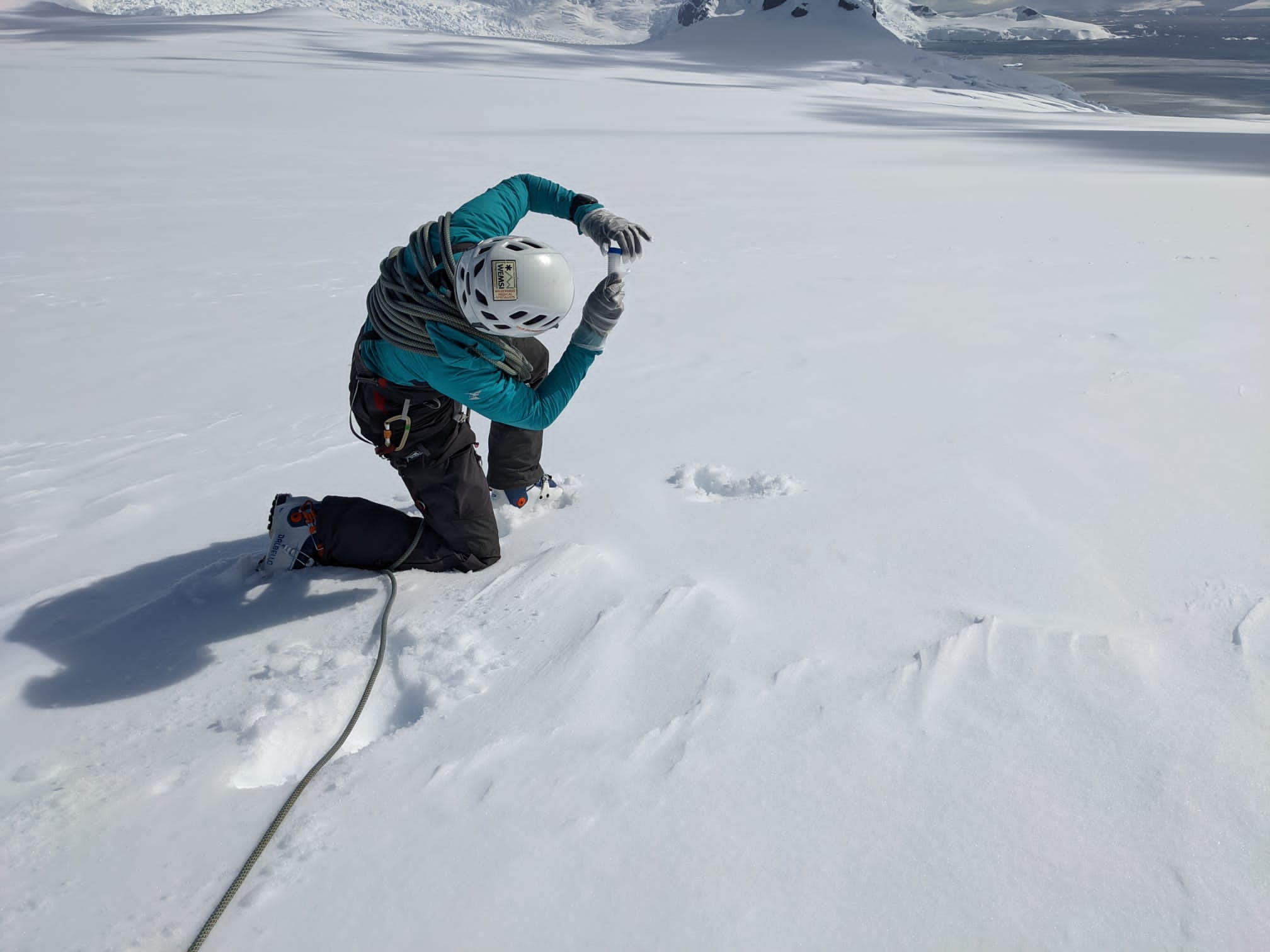 Taking snow sample for metal analysis