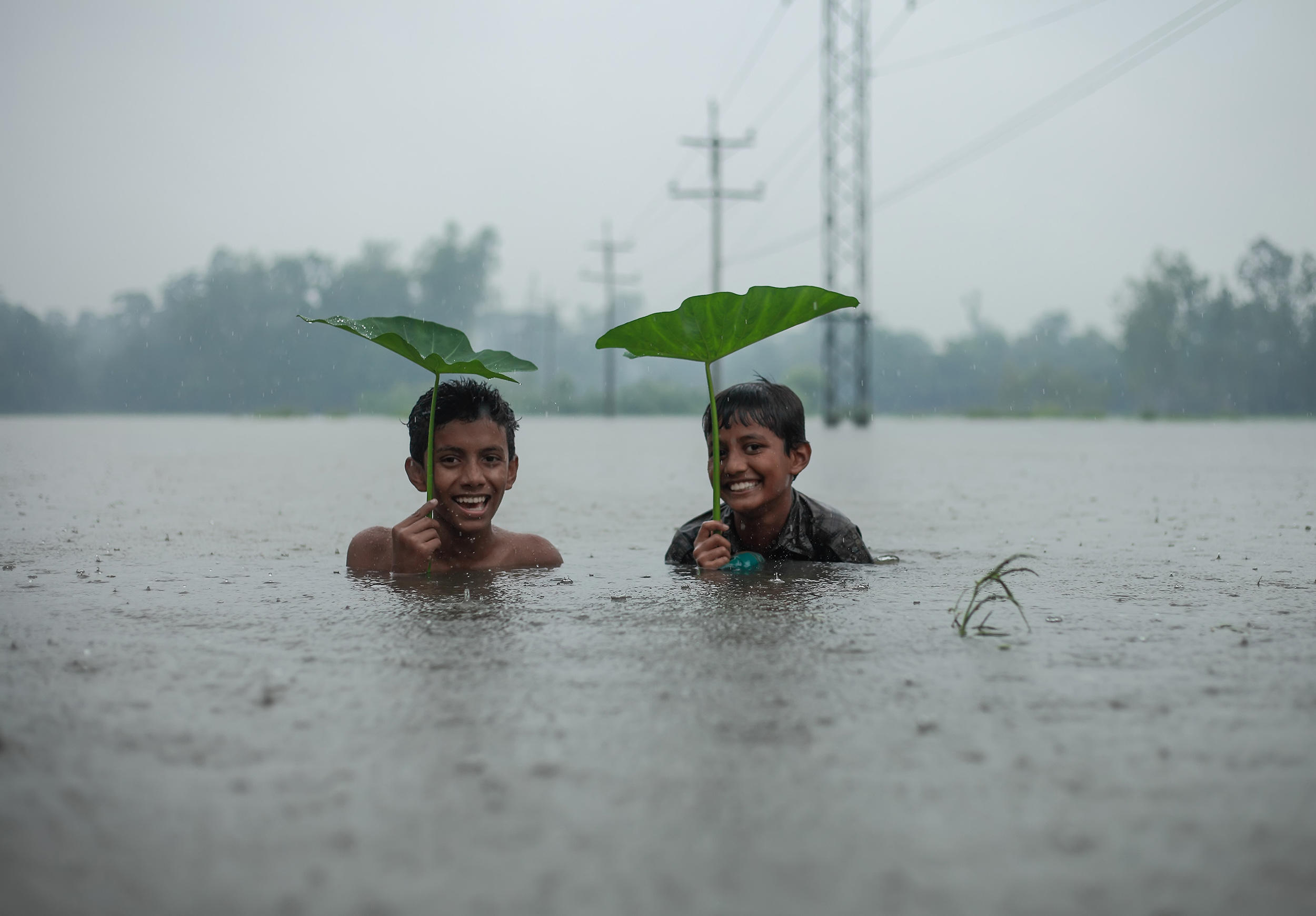 Kids playing in the rain