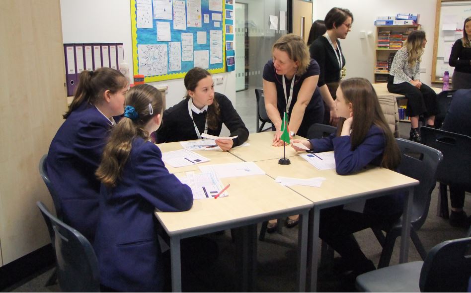 Sylvia Knight with students at Greenfaulds High School