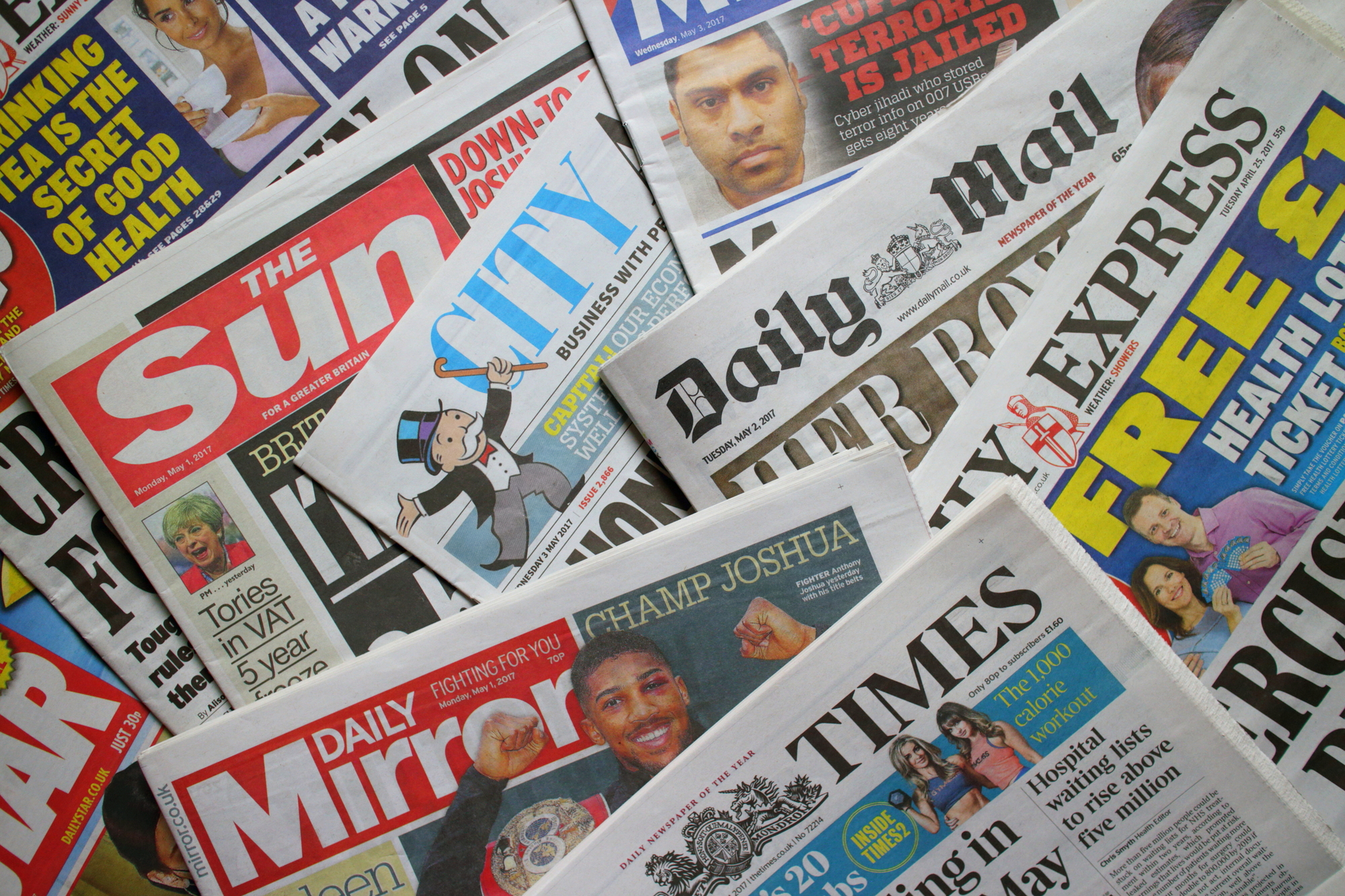 An image showing various front covers of British newspapers