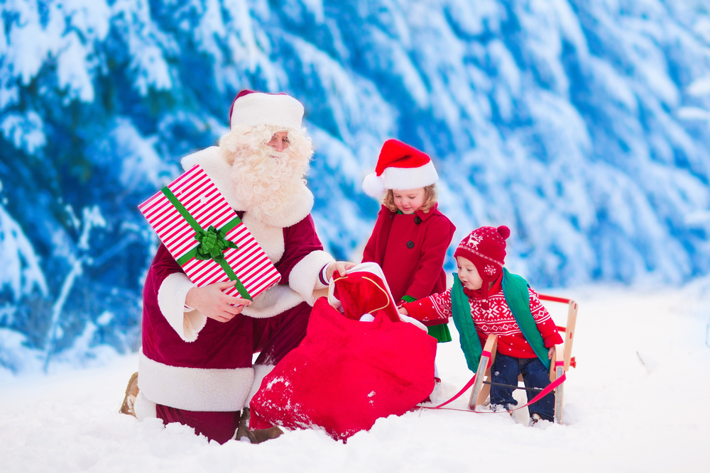 Father Christmas giving out presents Father Christmas giving out presents
